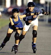 Couple rollerblading